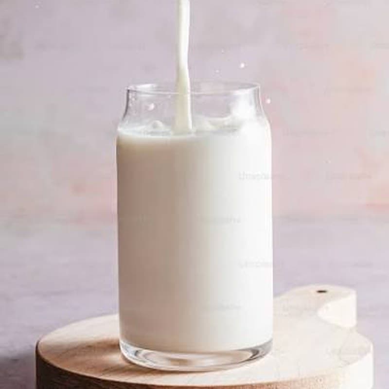 Fresh milk poured into a glass